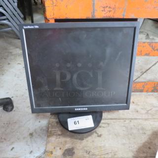 One Samsung Syncmaster 720N Monitor.