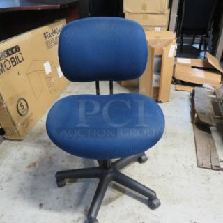 One Blue Cushioned Office Chair on Casters.