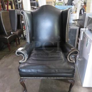 One Black Cushioned Arm Chair With Nail Head Trim. A Few Bad Spots See Pic.