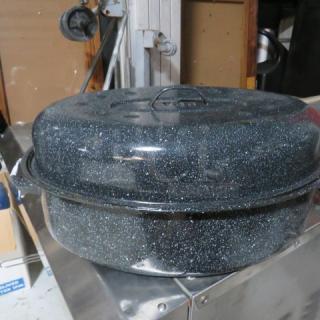One Roaster Pan With Lid.