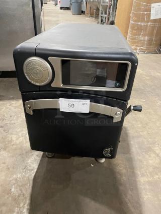 LIKE NEW! TurboChef! 2021 Late Model! Chipotle Style Commercial Black Electric Powered Countertop Ventless Rapid Cook Turbo Oven! Cook Press Edition! With Crank Bar! Model: NGO SN: NGOTD43642! 208/240V 1 Phase! On Legs!