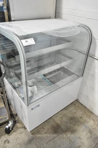 BRAND NEW SCRATCH AND DENT! Avantco 193BC36HCW 36" Curved Glass White Refrigerated Bakery Display Case on Commercial Casters. See Pictures of Side Glass Panel Damage. 110-120 Volts, 1 Phase. Tested and Working!
