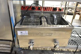 BRAND NEW SCRATCH AND DENT! 2024 Avantco 177F202 Stainless Steel Commercial Electric Powered 2 Bay Deep Fat Fryer w/ 2 Metal Baskets. 208-240 Volts, 1 Phase.