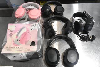 7 Various Headphones Including 3 Pink Barracuda and 4 Black. 7 Times Your Bid!