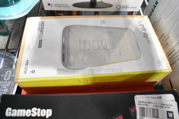 5 Various IN ORIGINAL BOX Items Including 2 Logitech Computer Mouse, Charger and Game Dock, Infinity Instant Go Wireless, TP Link Kasa Cam Smart Home Camera. 5 Times Your Bid! - Image 5 of 6