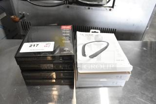 7 IN ORIGINAL BOX! Items Including LG Tone Bluetooth Headset. 7 Times Your Bid!
