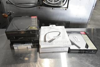 7 IN ORIGINAL BOX! Items Including LG Tone Bluetooth Headset. 7 Times Your Bid!