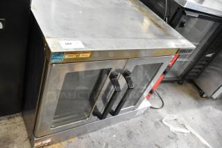 Vulcan VC4GD-11D150K Stainless Steel Commercial Natural Gas Powered Full Size Convection Oven w/ View Through Doors, Metal Oven Racks and Thermostatic Controls.