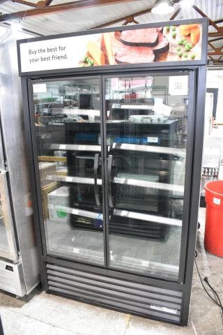 2023 True TVM-48SL-HC Metal Commercial 2 Door Reach In Cooler Merchandiser w/ Shelves. 115 Volts, 1 Phase. Tested and Working!