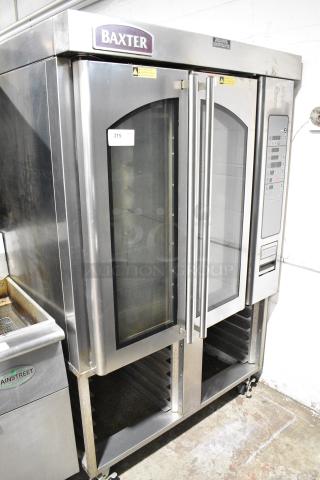 Baxter OV310G Stainless Steel Commercial Natural Gas Powered Mini Rotating Pan Rack Oven w/ Lower Pan Rack on Commercial Casters. Unit Was In Working Condition When Removed. See Pictures to See The Unit Working Before Removal.