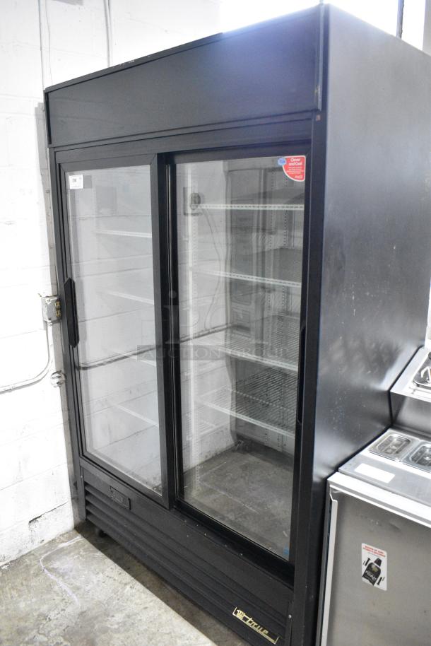 True GDM-45EM-LD Metal Commercial 2 Door Reach In Cooler Merchandiser w/ Poly Coated Racks on Commercial Casters. 115 Volts, 1 Phase. Tested and Powers On But Does Not Get Cold - Image 1 of 8