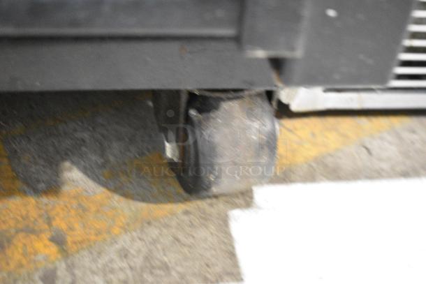 True GDM-45EM-LD Metal Commercial 2 Door Reach In Cooler Merchandiser w/ Poly Coated Racks on Commercial Casters. 115 Volts, 1 Phase. Tested and Powers On But Does Not Get Cold - Image 5 of 8