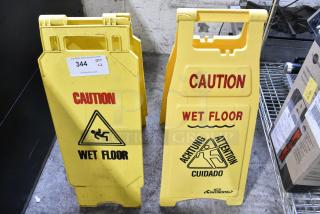 2 Yellow Poly Wet Floor Caution Signs. 2 Times Your Bid!
