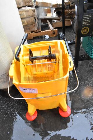 Yellow Poly Mop Bucket w/ Wringing Attachment on Commercial Casters.