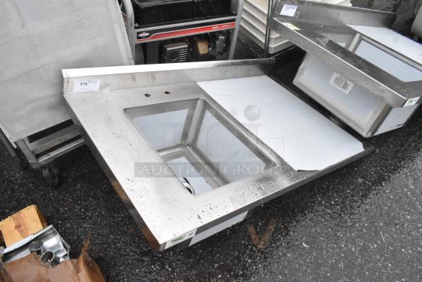 BRAND NEW SCRATCH AND DENT! Regency 600ST3048L 30" x 48" 16 Gauge Stainless Steel Work Table with Sink. No Legs. - Image 1 of 5