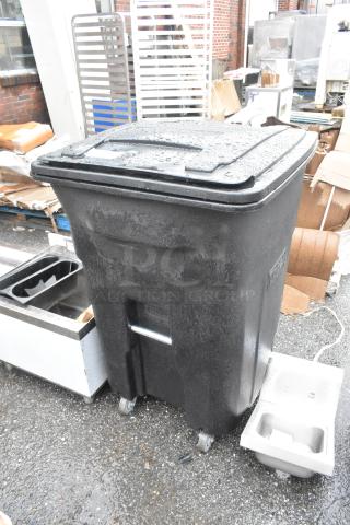 BRAND NEW SCRATCH AND DENT! Toter Black Poly Trash Can.