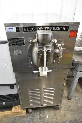 Electro Freeze FT-1 Stainless Steel Commercial Floor Style Water Cooled Batch Freezer on Commercial Casters. 230 Volts, 1 Phase.