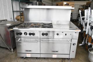 Vulcan 60SS-6B24GTN Stainless Steel Commercial Natural Gas Powered 6 Burner Range w/ Right Side Flat Top Griddle, 2 Ovens, Over Shelf and Back Splash on Commercial Casters.