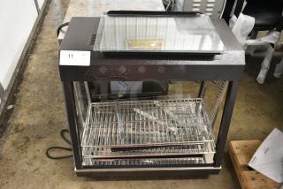 BRAND NEW SCRATCH AND DENT! 2024 Avantco 177HDC26 26" Self/Full Service 3 Shelf Countertop Heated Display Case with Sliding Doors. 120 Volts, 1 Phase.