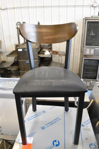 20 BRAND NEW SCRATCH AND DENT! Lancaster Table & Seating I164CBMRNGBFR Black Metal Dining Height Chair w/ Wooden Back Rest and Black Seat Cushion. 20 Times Your Bid!
