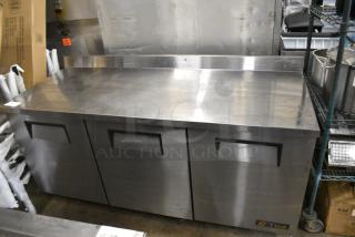 True TWT-72 Stainless Steel Commercial 3 Door Work Top Cooler on Commercial Casters. 115 Volts, 1 Phase.