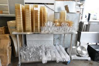 ALL ONE MONEY! Lot of Various Items Including Amber Colored Poly Drop In Bins, Poly Clear Pitchers, Poly 9G52-00 Measuring Scoop Half Moon. Does Not Include Table.