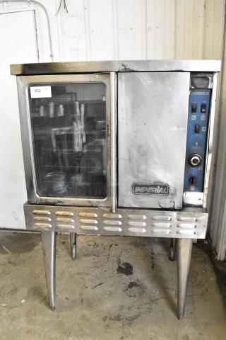 Imperial Stainless Steel Commercial Natural Gas Powered Full Size Convection Oven w/ View Through Door, Solid Door, Metal Oven Racks and Thermostatic Controls on Metal Legs.