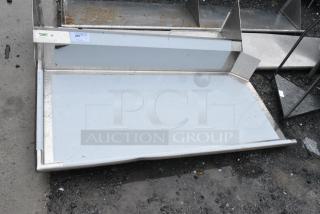 BRAND NEW SCRATCH AND DENT! Regency 600CDT60L 16 Gauge 5' Clean Dish Table. No Legs.