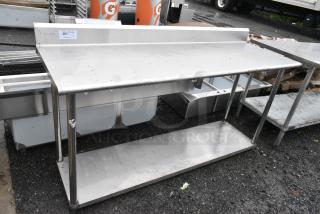 Stainless Steel Table w/ Back Splash and Metal Under Shelf.