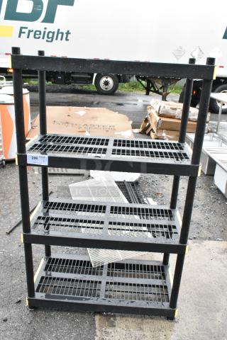 BRAND NEW SCRATCH AND DENT! Black Poly 4 Tier Shelving Unit. BUYER MUST DISMANTLE. PCI CANNOT DISMANTLE FOR SHIPPING. PLEASE CONSIDER FREIGHT CHARGES.