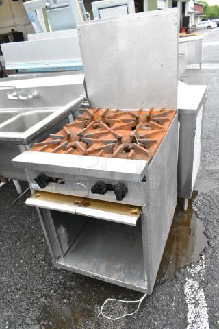 Garland SunFire Stainless Steel Gas Powered 4 Burner Range w/ Back Splash and Under Shelf.