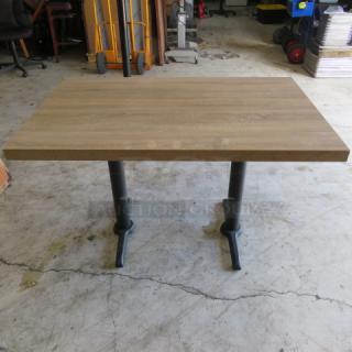 One 2 Inch Thick Tabletop On A Dual Pedestal Base. 48X30X30