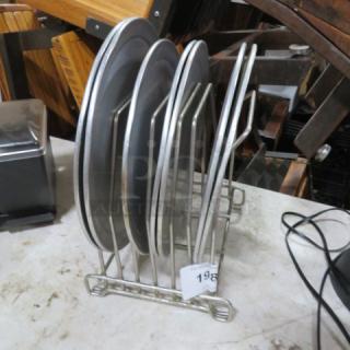 One SS Pan Rack With 9 Pizza Pans. - Item #1188224