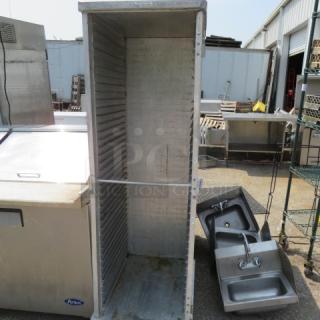 One Aluminum Holding Cabinet On Casters. No Door. 20.5X27X68.5