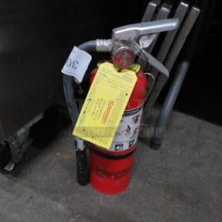 One ABC Fire Extinguisher.