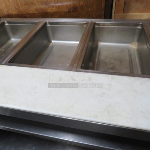 One Delfield 4 Well Electric Steam Table With A Cutting Board, And  SS Under Shelf On Casters. WORKING WHEN REMOVED,.  Model# EHE160C. 208-230 Volt. 1 Phase. Hardwired.  60X31.5X37. $5409.00 - Image 4 of 4