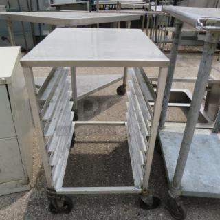 One Aluminum Speed Rack With Al Top On Casters. 20.5X26X34