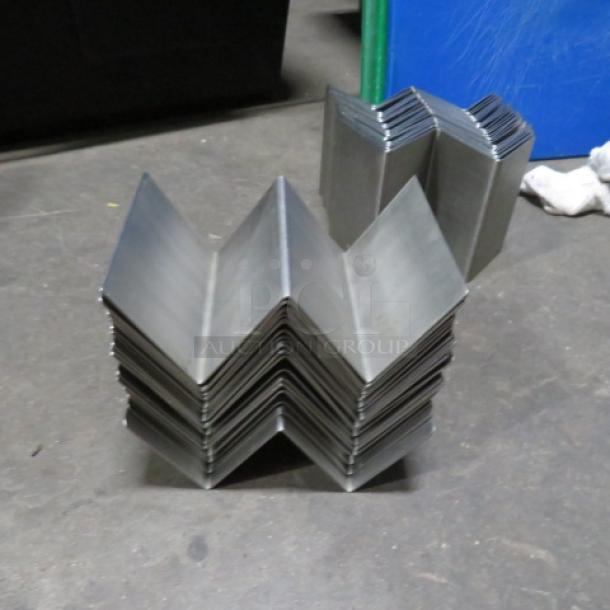 One Lot Of 25 Stainless Steel Taco Holders. - Image 1 of 1