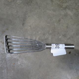 One Stainless Steel Slotted Turner.