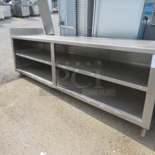 One Stainless Steel Work Table With 2 SS Under Shelves, And L Side Splash. 108X30X38