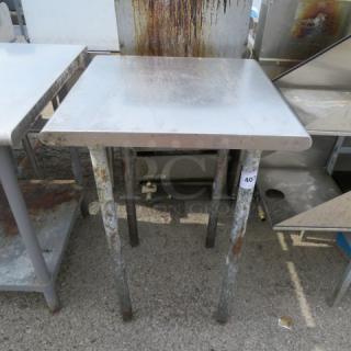 One Stainless Steel Table. 24X24X34