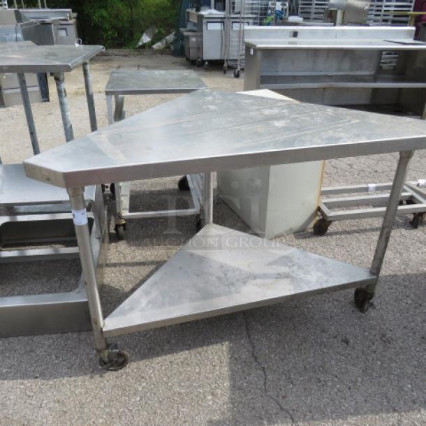 One Stainless Steel Corner Table With A Stainless Under Shelf On Casters. 56X32.5X36 - Image 1 of 3
