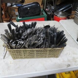 One Dishrack Holder Full Of Flatware.