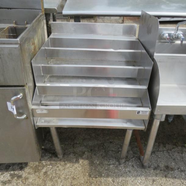 One Stainless Steel Under Bar 4 Tier Bottle Display. 24X25X32 - Image 1 of 1