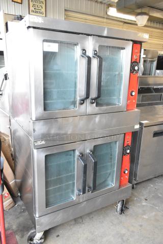 2 Vulcan VC4GD-167 Stainless Steel Commercial Gas Powered Full Size Convection Oven w/ View Through Doors, Metal Oven Rack and Thermostatic Controls on Commercial Casters. 2 Times Your Bid!
