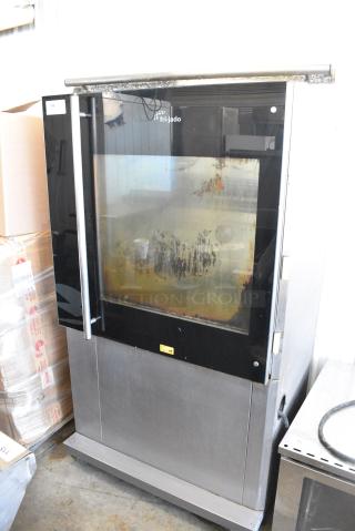 Fri-jado TDR 7-P Stainless Steel Commercial Electric Powered Rotisserie Oven w/ Under Shelf on Commercial Casters. 208 Volts, 3 Phase.