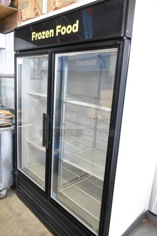 True GDM-49F-LD Metal Commercial 2 Door Reach In Freezer Merchandiser w/ Poly Coated Racks. 115/208-230 Volts, 1 Phase.