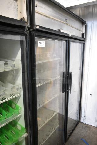 True GDM-52TM-RL-LD Metal Commercial 2 Door Reach In Cooler Merchandiser w/ Poly Coated Racks. 115 Volts, 1 Phase. Tested and Working! - Item #1182941