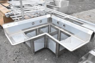 BRAND NEW SCRATCH AND DENT! Regency 600S3141414C 44 1/2" 16 Gauge Stainless Steel Three Compartment Commercial Corner Sink with Two Drainboards - 14" x 14" x 14" Bowls. No Legs.