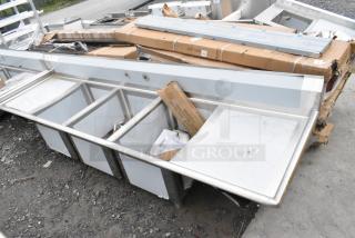 BRAND NEW SCRATCH AND DENT! Regency 600S318424224 Stainless Steel 3 Bay Sink w/ Dual Drain Boards.